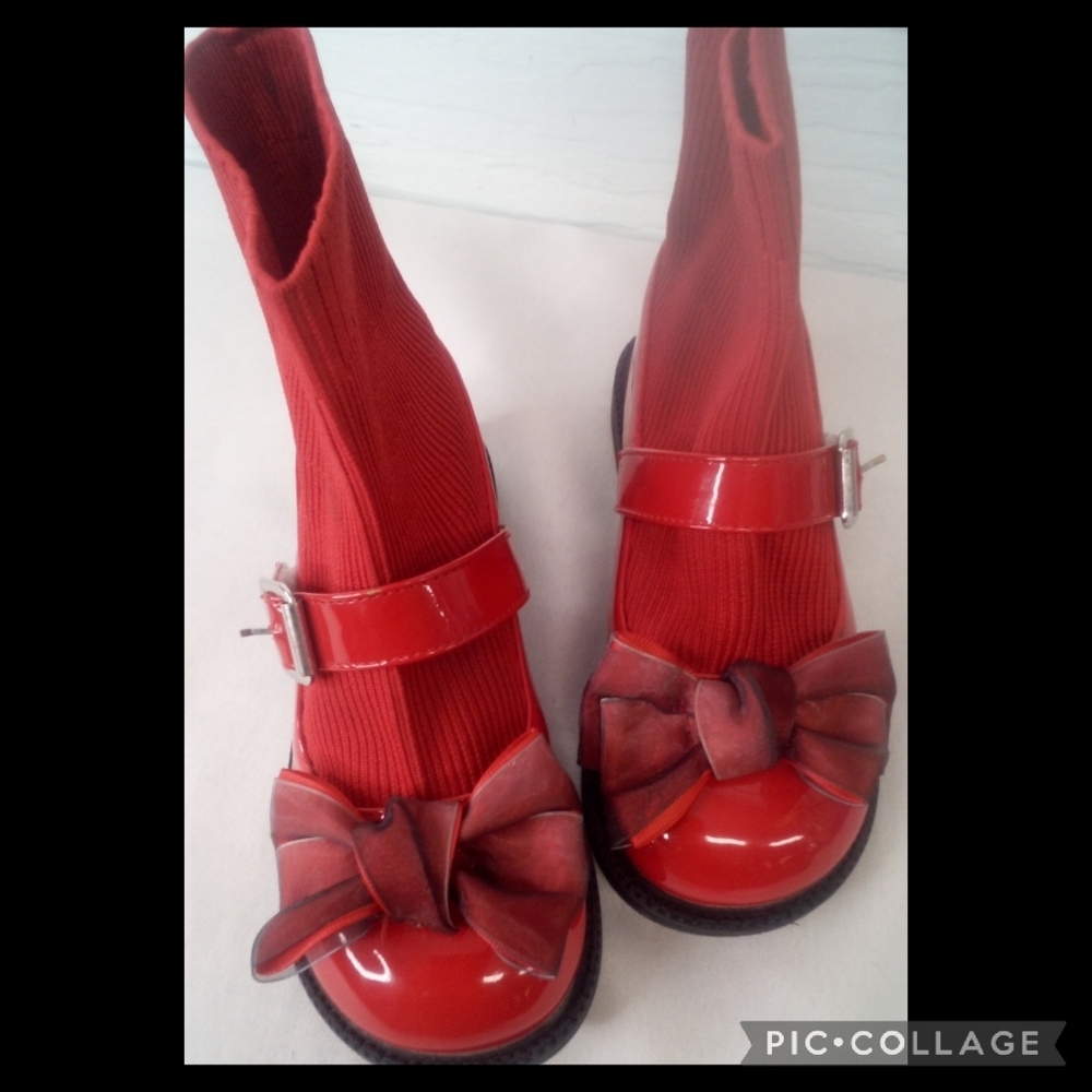 Red patent leather sock boots.